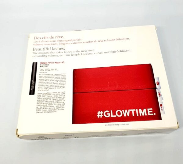 Trousse « Glowtime » Clarins avec miniature du mascara Wonder Perfect 4D Clarins.
